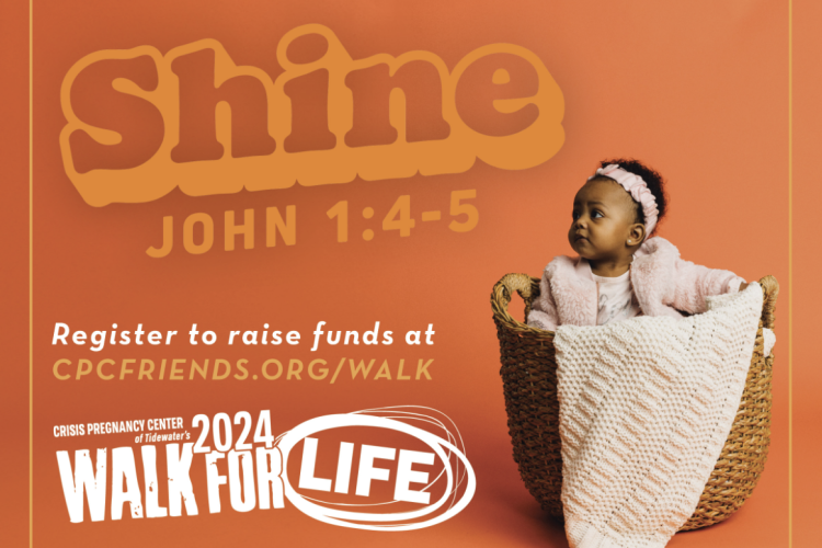 walk for life registration image. cute baby in a basket